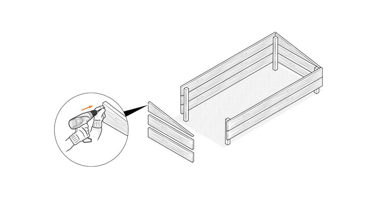 Alguien utiliza el taladro de batería para fijar los tablones en las vigas para construir una cama caliente.